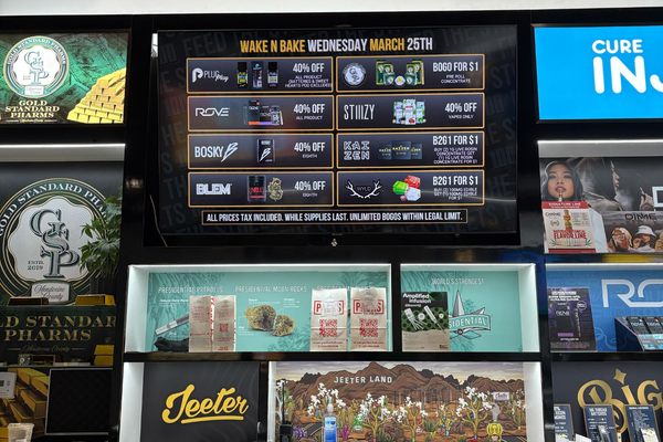 Dispensary digital deal board showing in-store specials and cannabis products