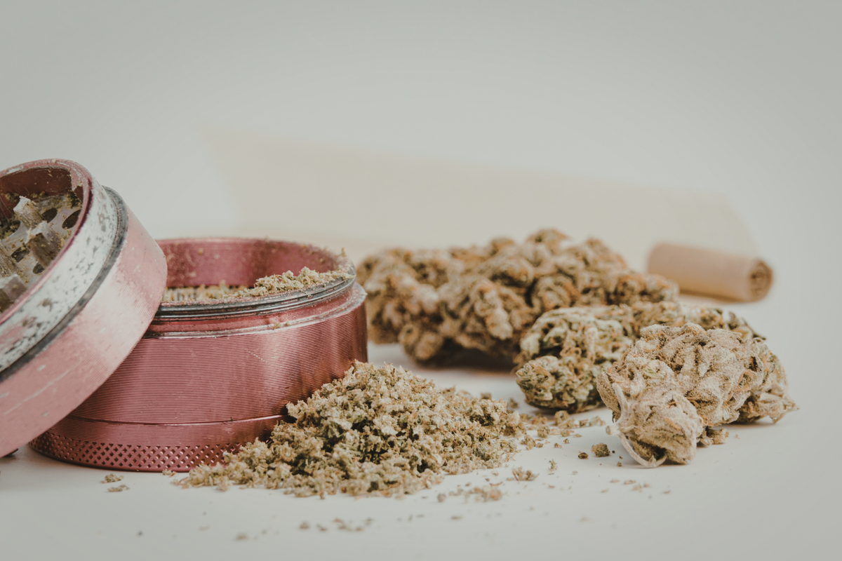 Rose gold herb grinder with freshly ground kief weed