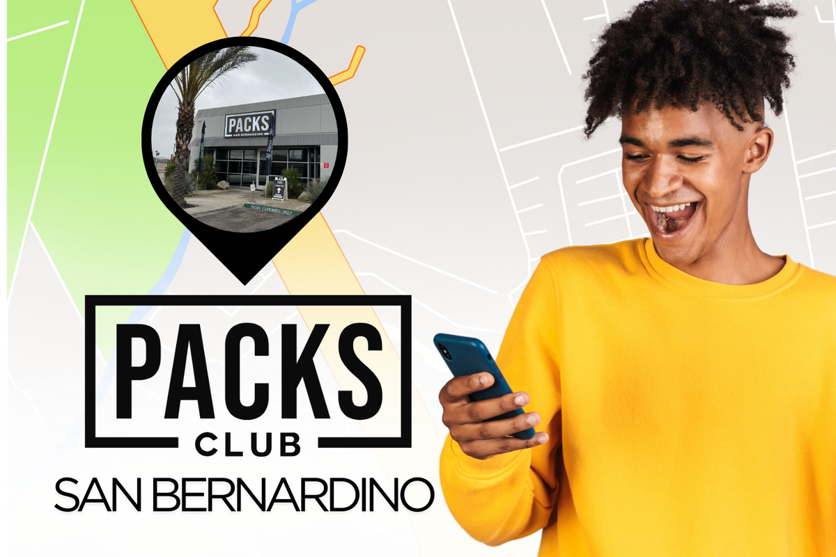 A young person in a yellow sweatshirt looks at their phone, with a map graphic and a PACKS CLUB SAN BERNARDINO logo behind them. A circular inset shows the exterior of the PACKS building.