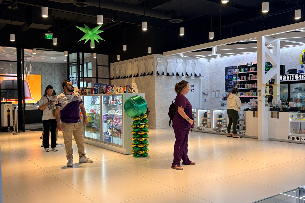Modern dispensary interior with concentrates and wellness displays